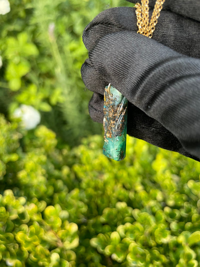 Carved Opalized Wood Pendant