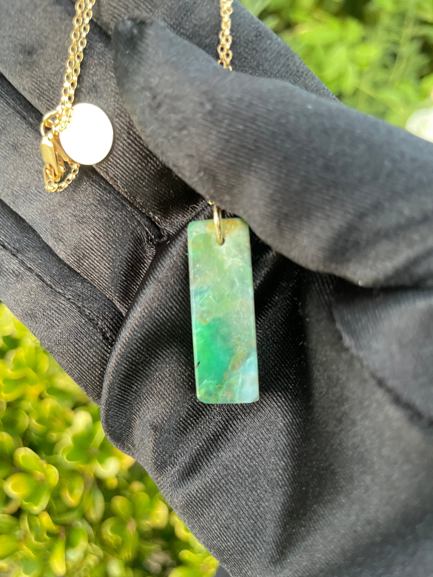 Carved Opalized Wood Pendant