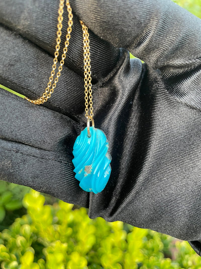 Carved Turquoise Pendant