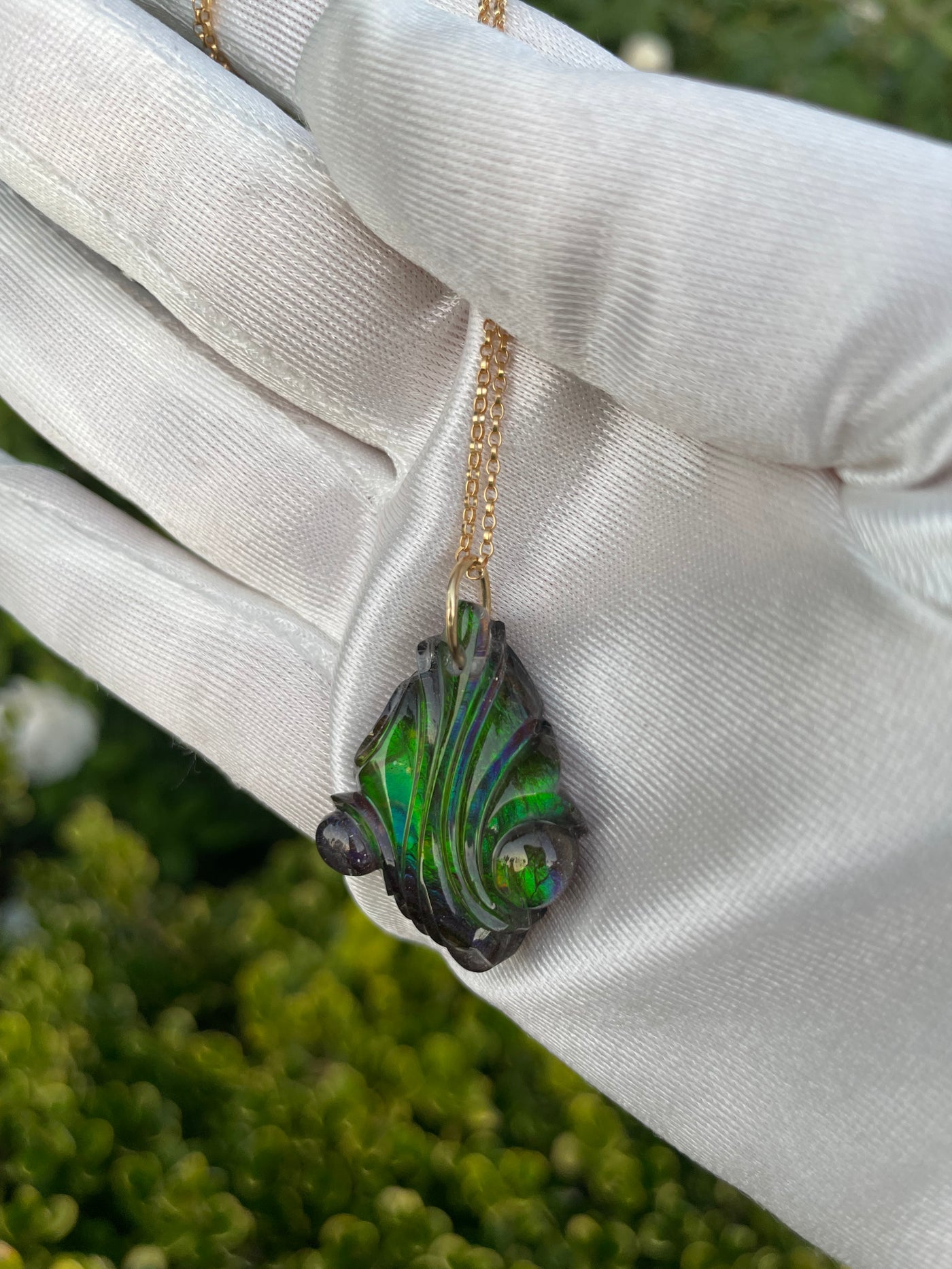 Carved Ammolite Pendant
