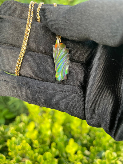 Carved Ammolite Pendant