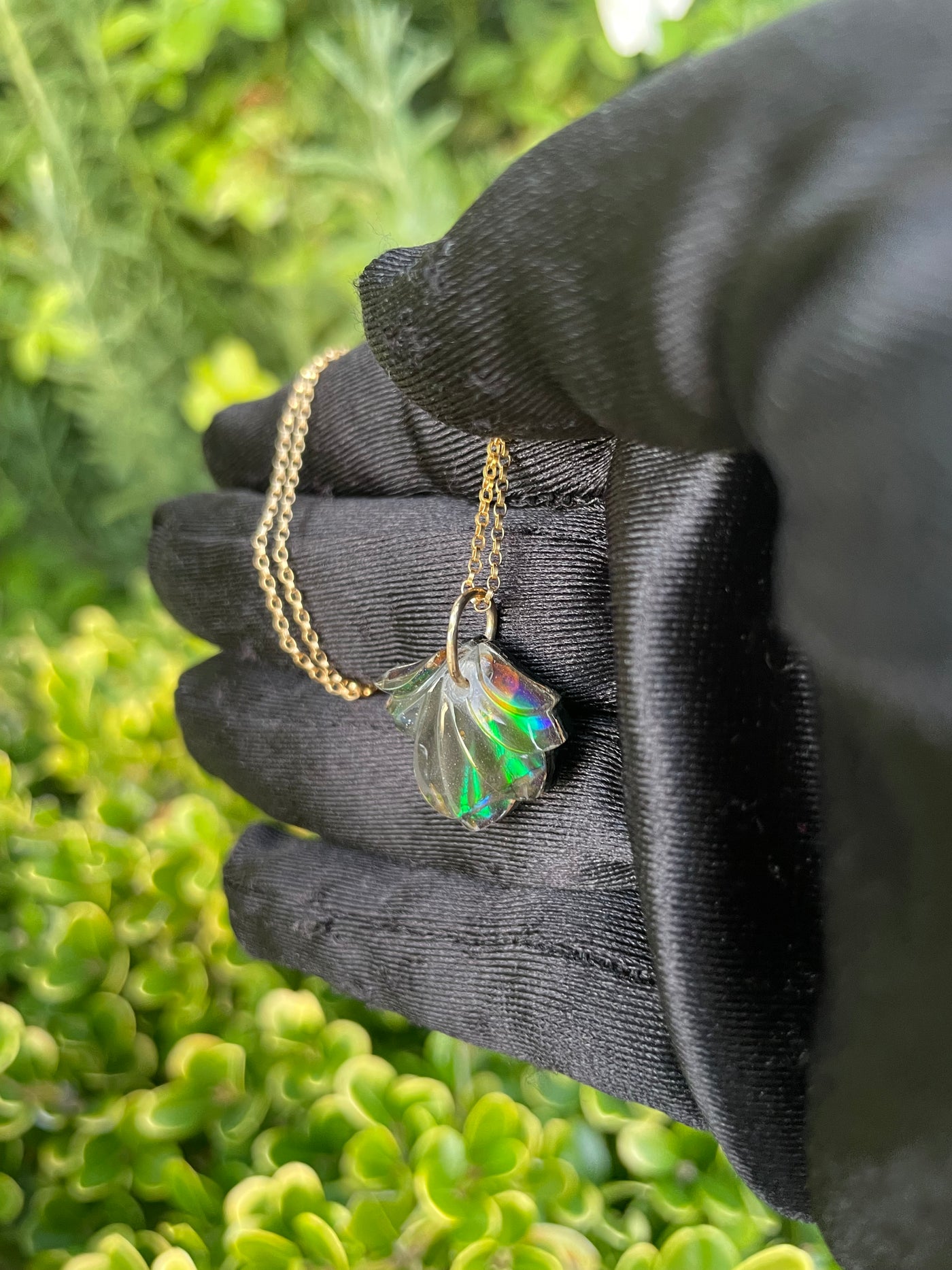 Carved Ammolite Pendant