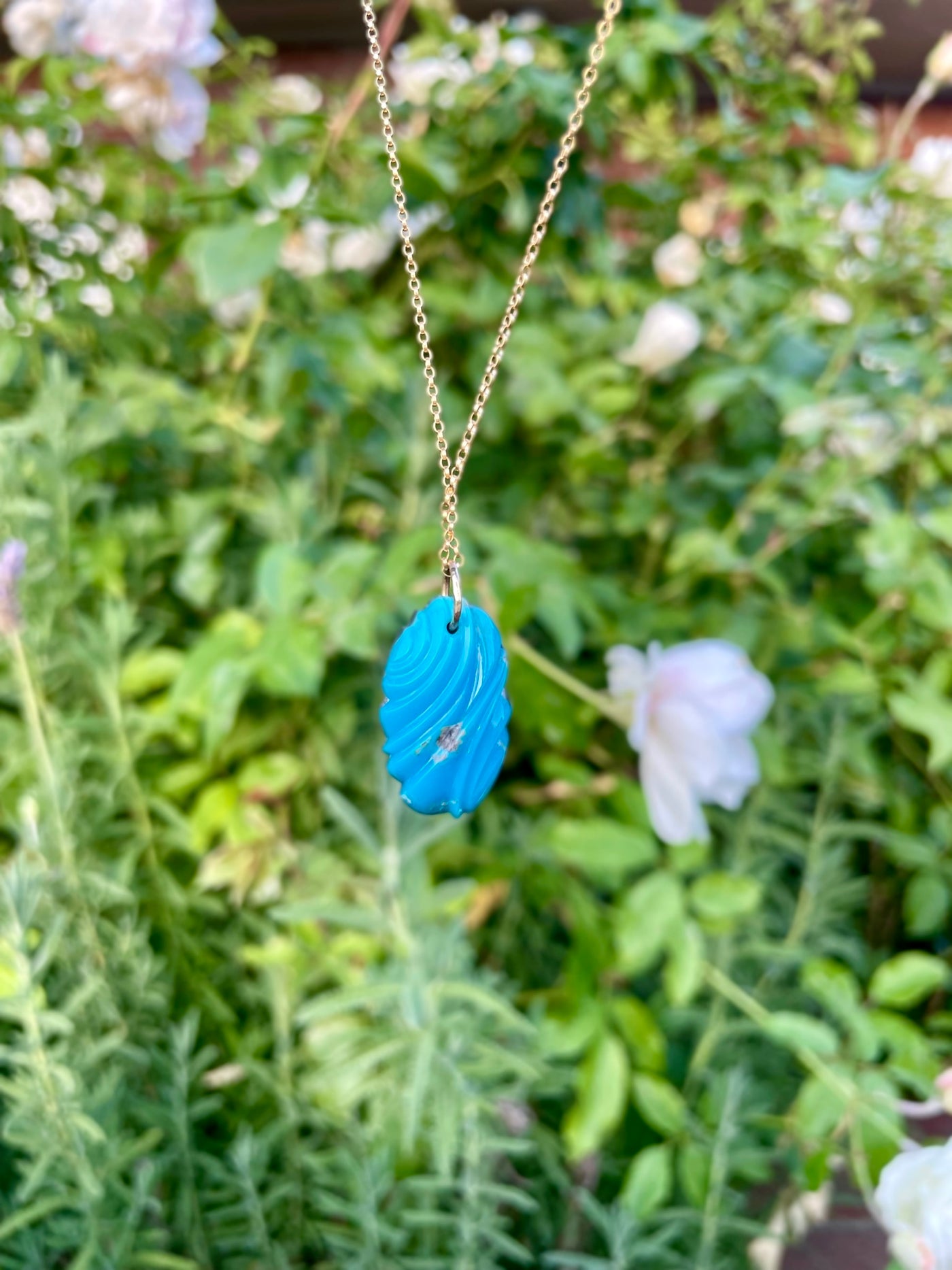 Carved Turquoise Pendant