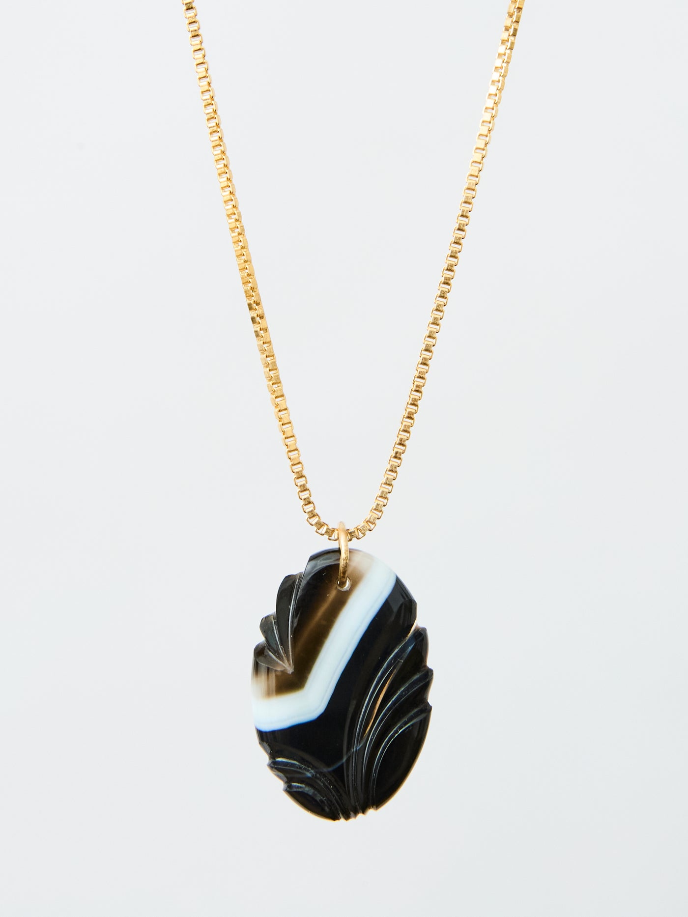 Carved Banded Onyx Pendant