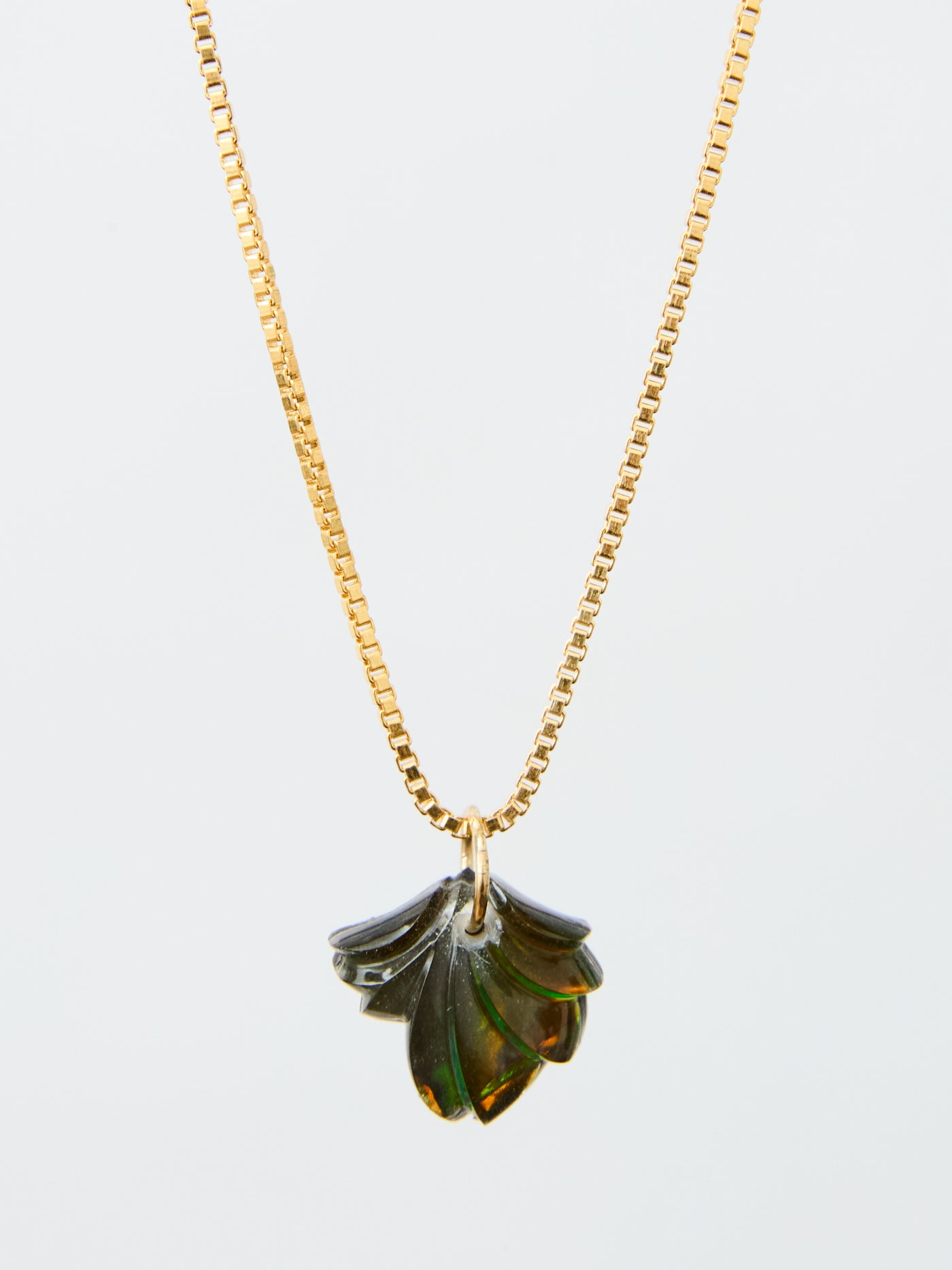 Carved Ammolite Pendant