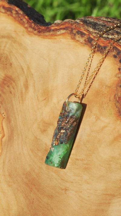 Carved Opalized Wood Pendant